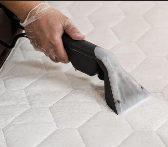 Extraction tool removing dust mites and soil from a mattress